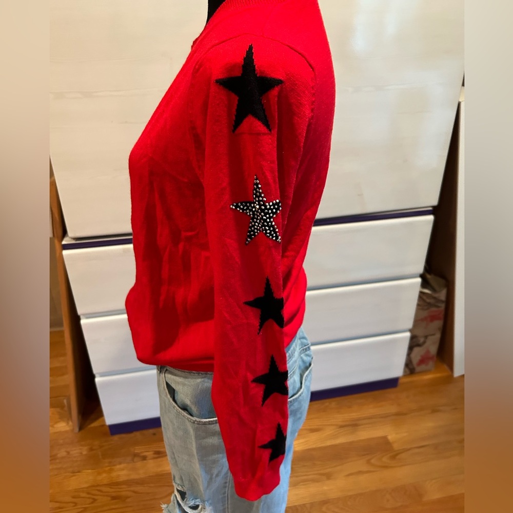 Elan red long sleeve shirt with stars on sleeve size M/L
